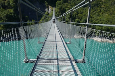 Cross the suspension bridge