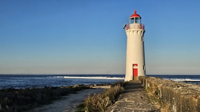 Walk the breakwater out to the lighthouse